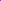 Colorful night light projector with remote control on a purple wall background