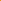 Star fairy lights with a teddy bear inside a wooden teepee against an orange curtain.